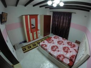 Hotel Buza 객실 침대