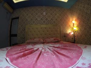 Hotel Buza 객실 침대