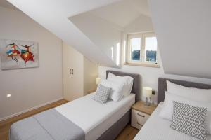 Postel nebo postele na pokoji v ubytování Heritage Villa Unique + 39 fotografií