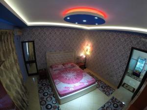Hotel Buza 객실 침대
