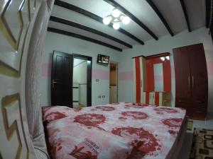 Hotel Buza 객실 침대