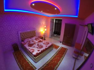 Hotel Buza 객실 침대