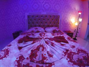 Hotel Buza 객실 침대