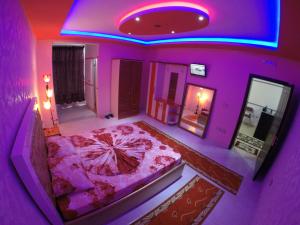 Hotel Buza 객실 침대