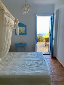 Ένα ή περισσότερα κρεβάτια σε δωμάτιο στο The Seaview Lodge