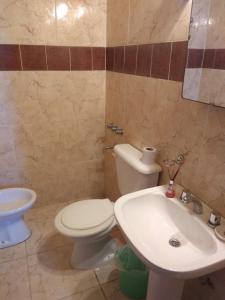 Ett badrum på Hotel Residencial Marlis