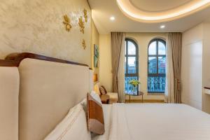Katil atau katil-katil dalam bilik di Golden Tree Hotel & Apartment
