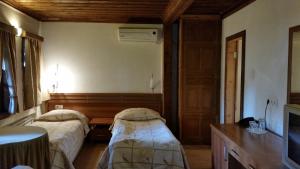 Postel nebo postele na pokoji v ubytování Chakarova Guest House + 27 fotografií
