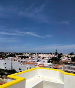 a view of a city from the roof of a building at Vila Horizonte in Carvoeiro