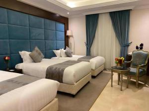 Letto o letti in una camera di Three Points Al Salama