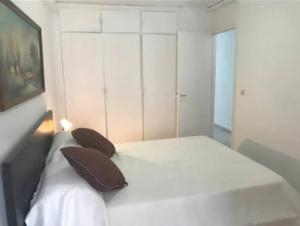 A bed or beds in a room at Viña Del Mar - Costa Adeje