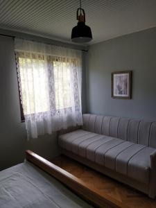 Postel nebo postele na pokoji v ubytování Drinski pogled