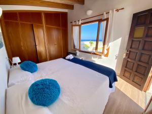 Postel nebo postele na pokoji v ubytování Sa Punta Dúplex Cala Ratjada