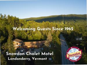 a banner for the welcome guestliest since at a mountain at Snowdon Chalet Motel in Londonderry