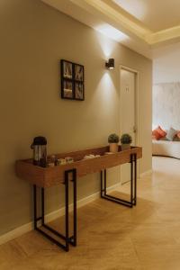 a wooden altar in a room with a bed at Kokoa Hotel Cusco in Cusco