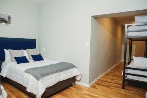 Rúm í herbergi á Kokoa Hotel Cusco