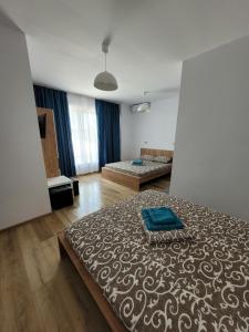 Postel nebo postele na pokoji v ubytování Vila Ayra