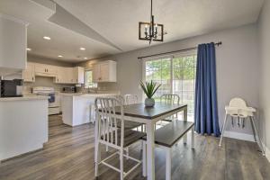 a kitchen and dining room with a table and chairs at Family-Friendly Cedar City Home Yard and Grill in Cedar City