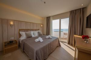 Postel nebo postele na pokoji v ubytování Merar Hotel