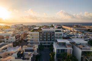 an aerial view of a city at sunset at The Reef 28 - Adults Only - All Suites - Optional Gourmet All Inclusive in Playa del Carmen