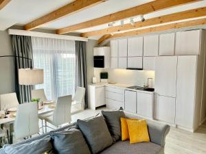 Posezení v ubytování Nowe Apartamenty Puck