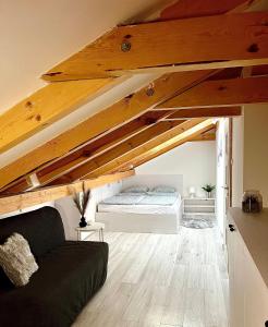Postel nebo postele na pokoji v ubytování Nowe Apartamenty Puck