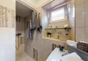 Koupelna v ubytování Apartman Tina + 8 fotografií