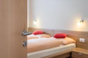 A bed or beds in a room at Hilber App Sass Rigais