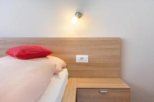 A bed or beds in a room at Hilber App Sass Rigais