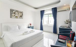 Postel nebo postele na pokoji v ubytování La Casona Hotel