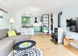 Kuchyň nebo kuchyňský kout v ubytování Apartament Oliwkowy