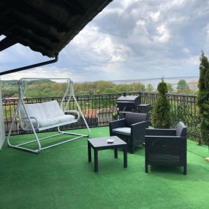 Balkón nebo terasa v ubytování Willa Wicko - Międzyzdroje - apartamenty z aneksem - widok na Zalew Szczeciński