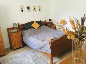 Posteľ alebo postele v izbe v ubytovaní KATÓ APARTMAN