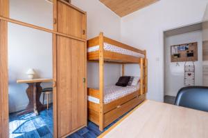 Letto o letti in una camera di Cosy 40m With Balcony In The Heart Of Chamonix