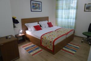 Postel nebo postele na pokoji v ubytování Split Centre Zlatan Rooms&Studio
