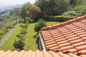 an aerial view of a roof of a house at GuestReady - Crestuma Bright in Crestuma