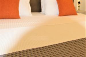 A bed or beds in a room at Aiolos Apartments Suites Ermou 64 Monastiraki Plaka 2nd Floor