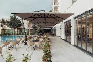 Bazén v ubytování Delight Hotel & SPA nebo v jeho okolí