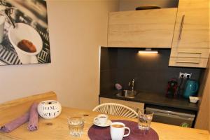 A kitchen or kitchenette at Aiolos Apartments Suites Ermou 64 Monastiraki Plaka 2nd Floor
