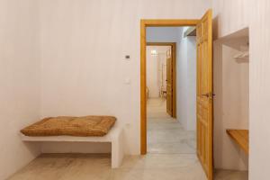 A bed or beds in a room at Casa Santiago House Boutique