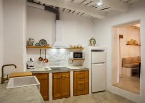 A kitchen or kitchenette at Casa Santiago House Boutique