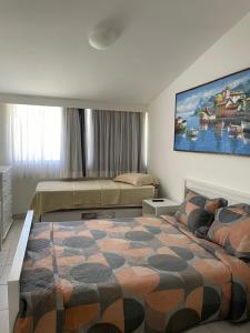 เตียงในห้องที่ Flat no Nannai Residence