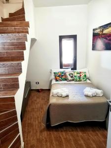Postel nebo postele na pokoji v ubytování A due passi dal centro Sweet Rooms