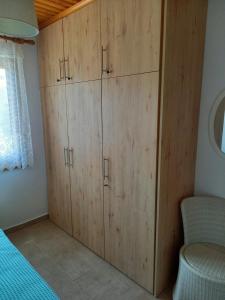 Łóżko lub łóżka w pokoju w obiekcie Villa Niki