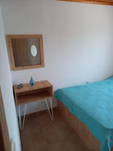Łóżko lub łóżka w pokoju w obiekcie Villa Niki