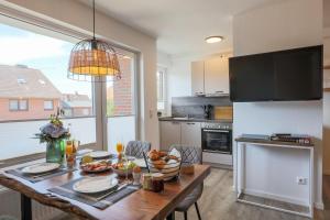 Køkken eller tekøkken på Haus Treibholz Apartment 6 + 14 billeder