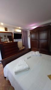 Appartamento in zona residenziale tesisinde bir odada yatak veya yataklar