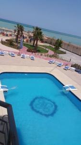 Изглед към басейн в Hurghada Casablanca Beach-Red Sea или наблизо