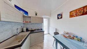 Kuchyň nebo kuchyňský kout v ubytování Zephir Apartments