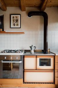 Kuchyň nebo kuchyňský kout v ubytování Agriturismo Il Conte Vassallo + 16 fotografií